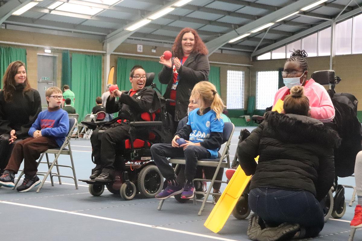 Disabled young people play boccia