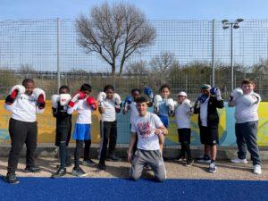 group of children with boxing gloves