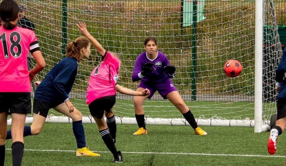 Girls playing football