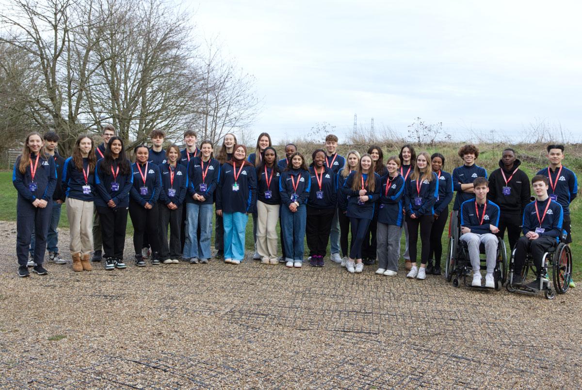 group of young people smile at camera