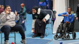1 light skinned male, 1 brown skinned female wearing hijab and 1 black male in wheelchair playing boccia