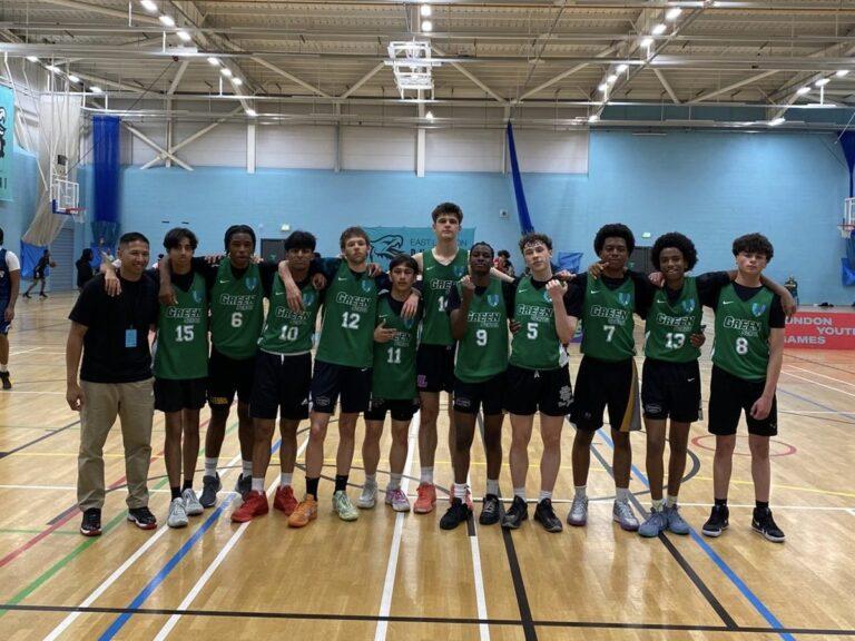 mixed ethnicity basketball boys smile