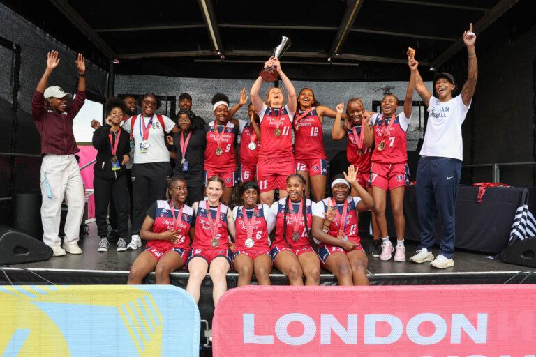 ethnically diverse basketball girls on stage