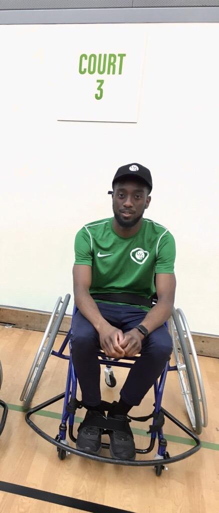 Nana, black male in green t shirt