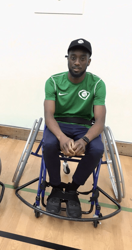 Nana, black male in green t shirt
