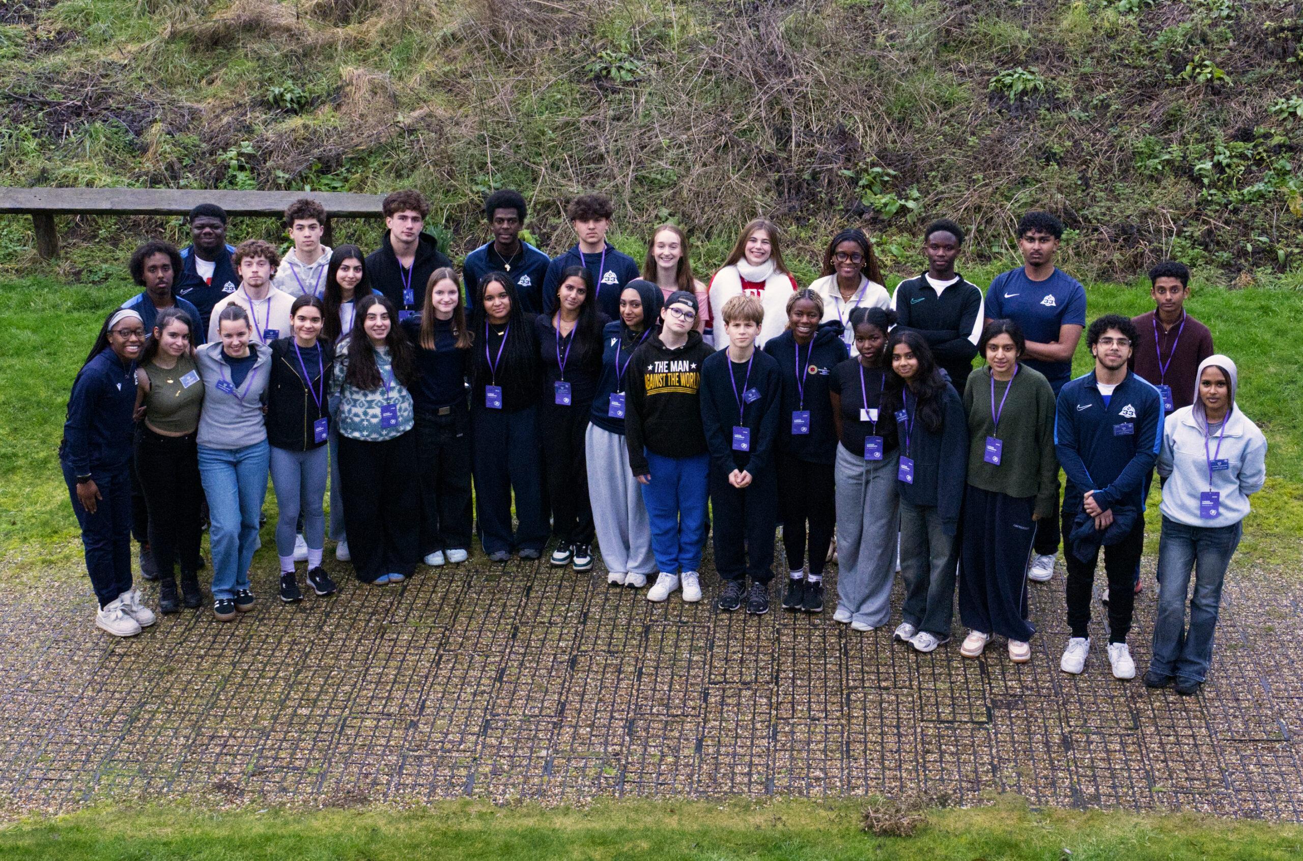 Ethnically divere young people smile
