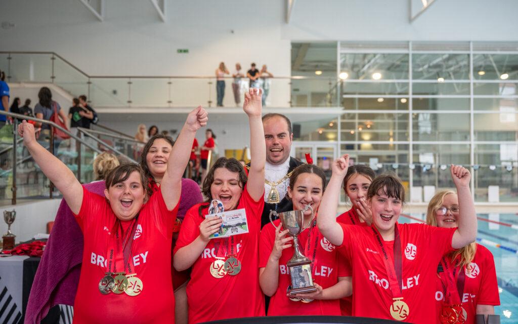 Bromley girls celebrate with trophy