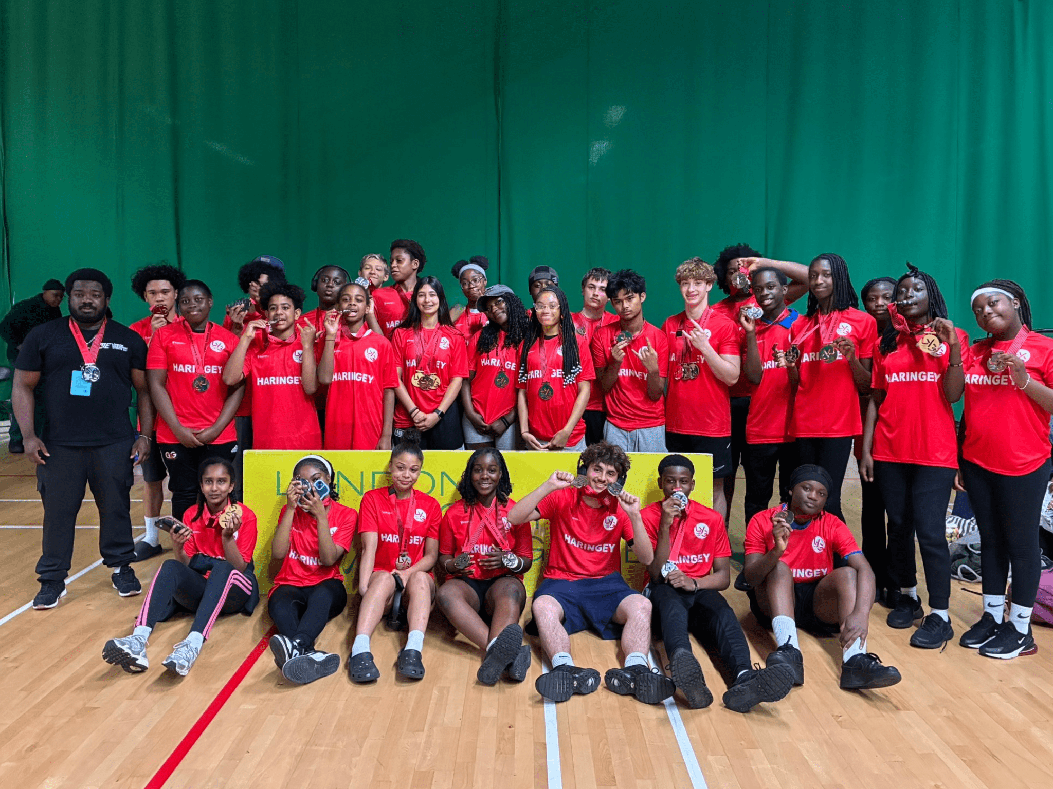 Mixed ethnicity boys and girls smile